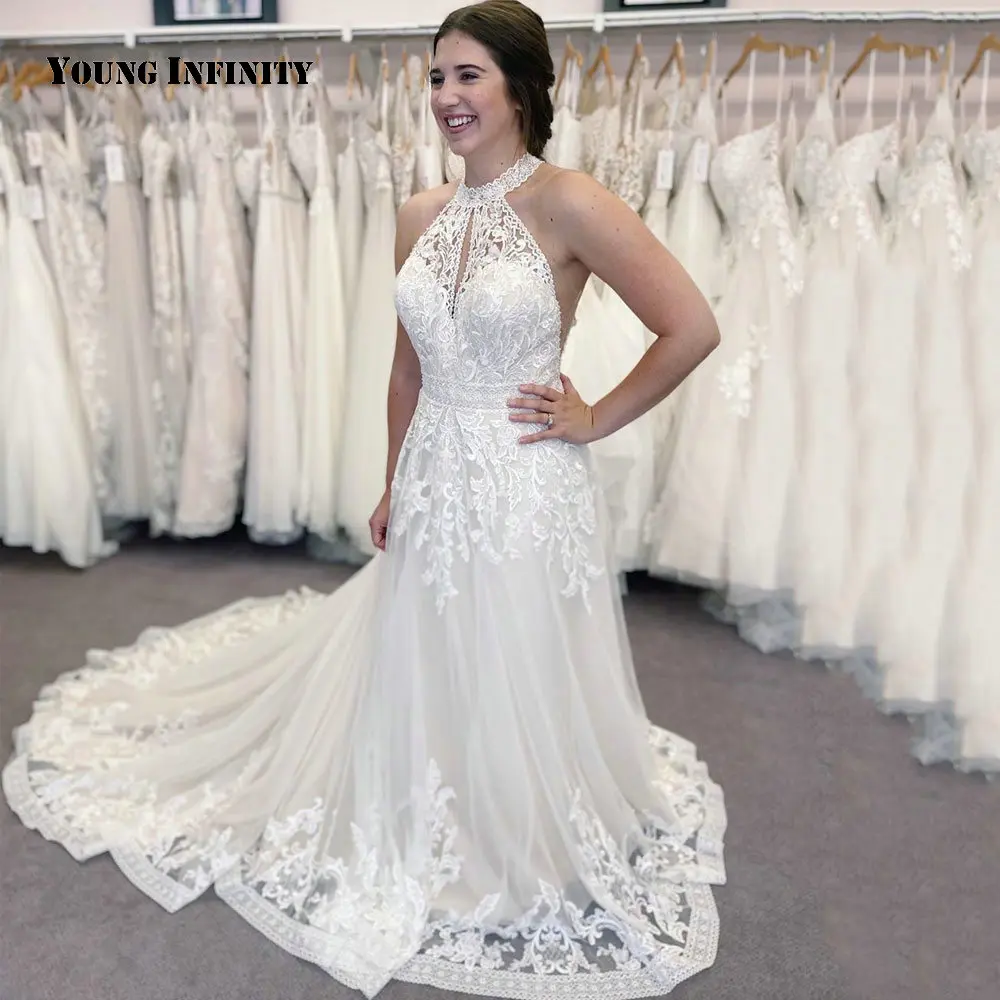 Zarif Halter düğün elbisesi 2021 Backless Kolsuz Dantel Aplikler Chaple Tren Kat Uzunluk Balo gelin kıyafeti